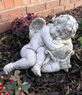 Sleeping Cupid Stone Garden Ornament Statue