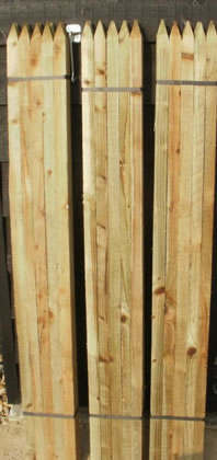 Image of 10 x 1.5m (5ft) 32mm x 32mm square & pointed pressure treated tree stakes