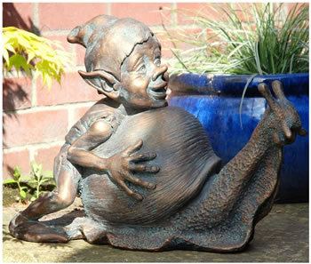 Image of Pixie Pushing a Giant Snail in Antique Bronze