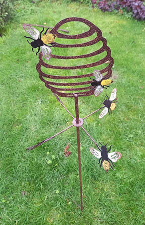 Image of Bee Spinner Border Stake With 4 Bees Spinning Round The Hive - 120cm