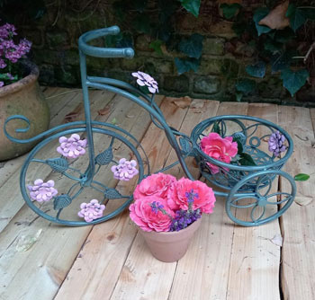Image of Tricycle Plant Pot holder with Pink Flower motifs - 40cm tall