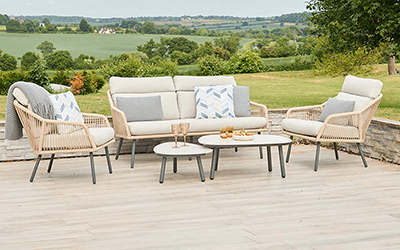 LG Malibu 4 seat loungeset, with padded seats, Cream rope frame , on a patio in a garden 