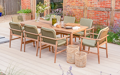 Studio image of Kettler Meadow 8 Seat Dining Set, with 8 chairs with seat pads and rectangular dining table, in a Greengrey colourway