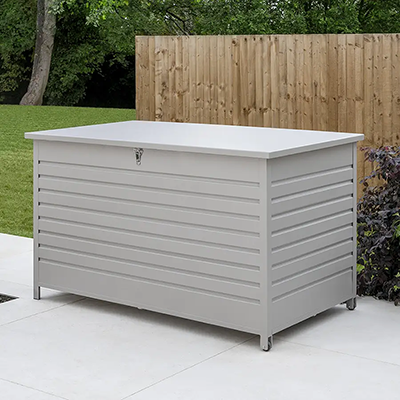 Studio image of Kettler Pebble Large Storage Box, with a slatted metal frame and open lid