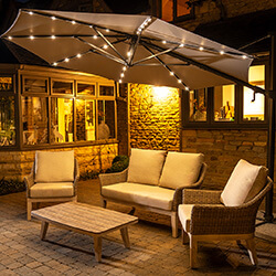 Extra image of Kettler Orion 3.0m Round LED Cantilever Parasol with Side Tilt, Granite Base & Night Cover - Grey Frame / Stone Canopy